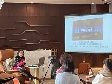 A person giving a presentation Description automatically generated with low confidence